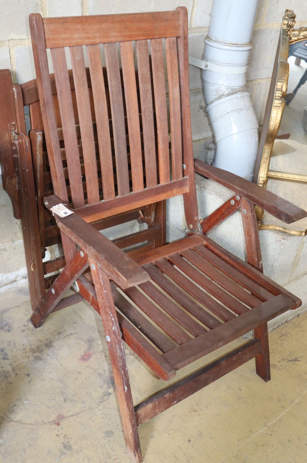 Three teak folding garden elbow chairs